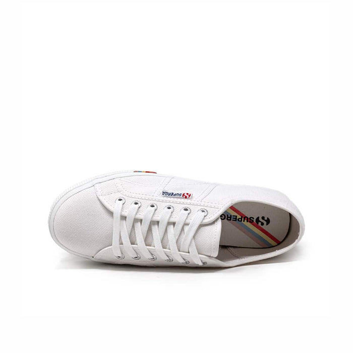 White sneaker outsole and interior view with lace-up closure