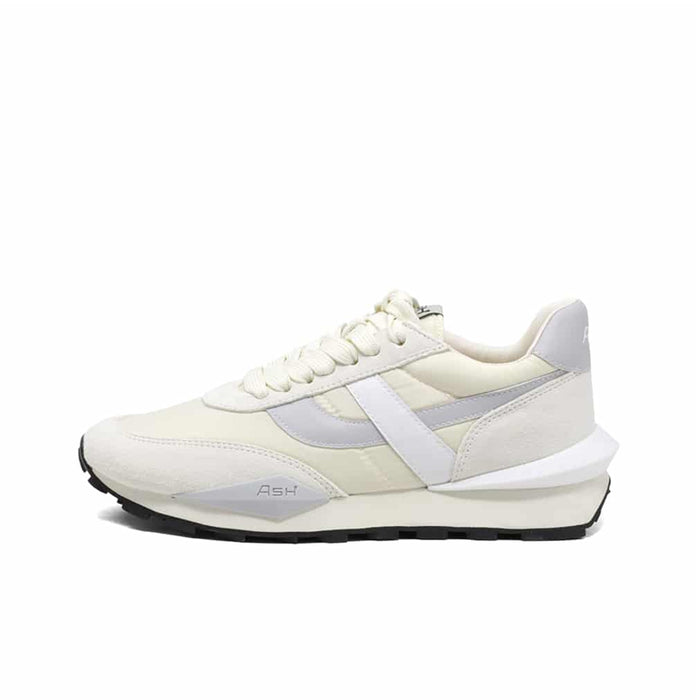 White womens leather low-top sneakers with light blue stripe detail and black outsole