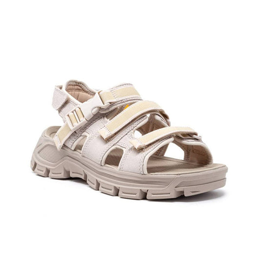 Women’s white leather sport sandals with adjustable buckle straps and cushioned sole