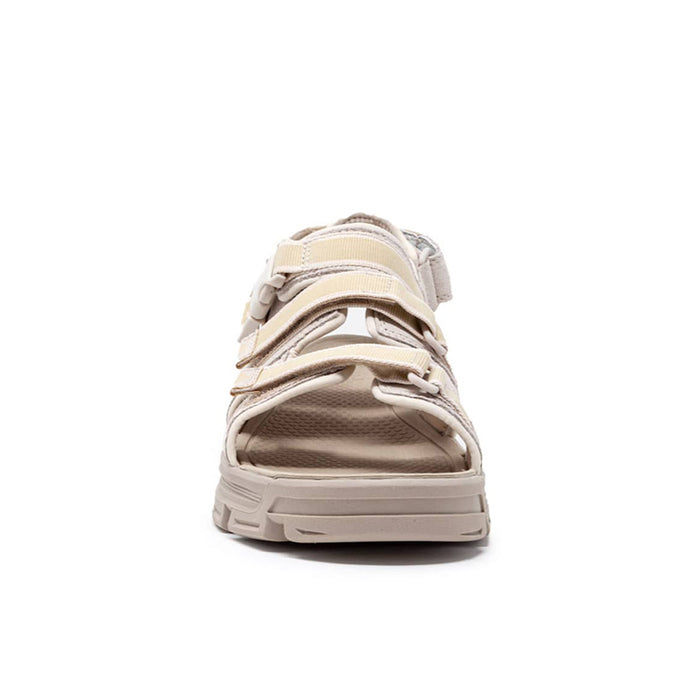 Women’s white leather sandals with hook-and-loop straps and thick sole, rear view
