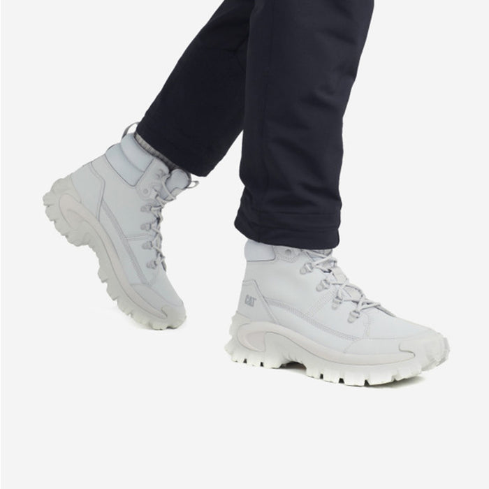 Women's lace-up winter boots, light grey on-foot view with chunky tread sole and laces