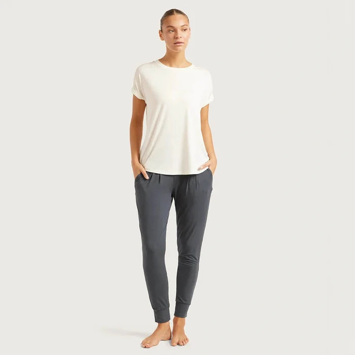 A woman modelling Boody's Downtime Lounge Pants in Storm with a casual white t-shirt.