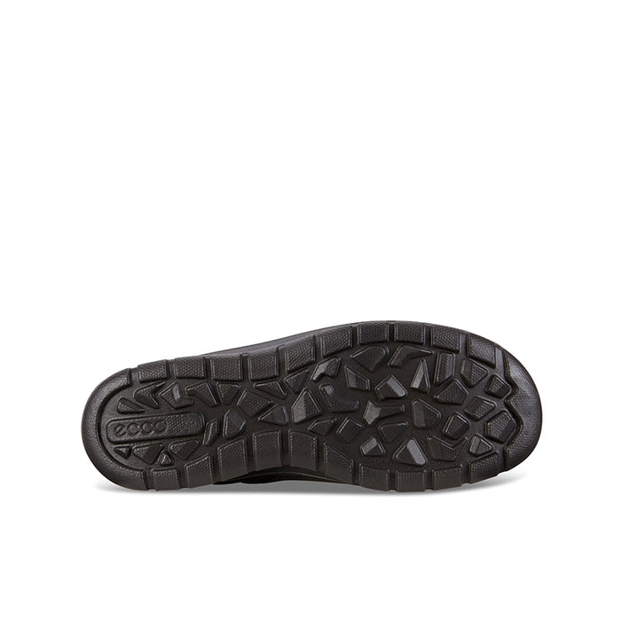 Boot outsole with deep tread pattern and thick rubber heel