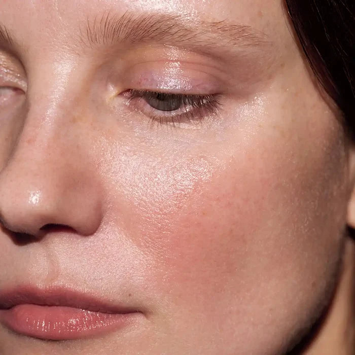 Close-up of a person's eye and cheek.