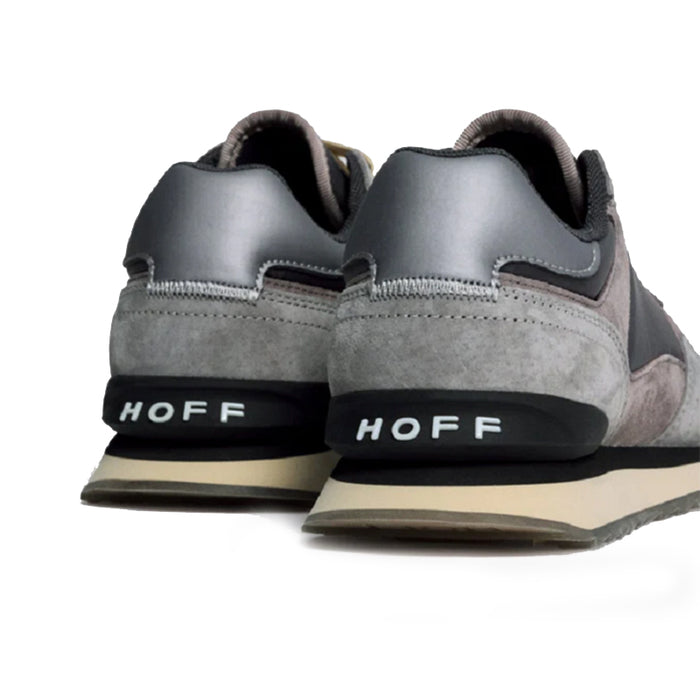 Back view of gray and dark multicolor leather sneakers with HOFF logo on heel.