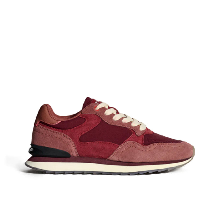 Women’s red-burgundy leather low-top sneakers with lace-up front and rubber sole