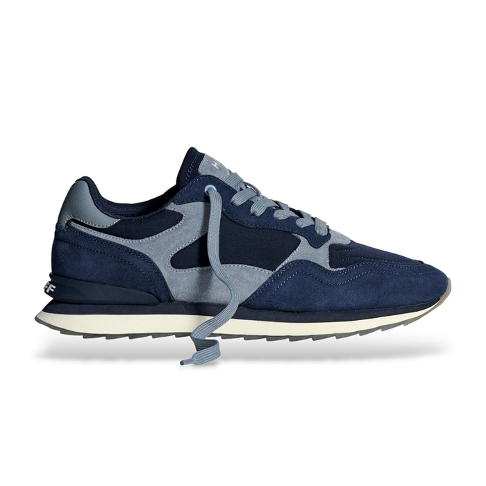 Men's blue leather sneakers with lace-up front and navy suede overlays