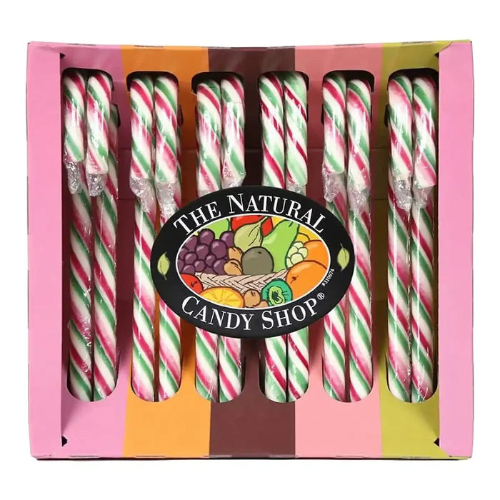 A boxed set of candy canes with pink, green, and white diagonal stripes, presented in a colorful retail box with a central oval label reading 'The Natural Candy Shop.'.
