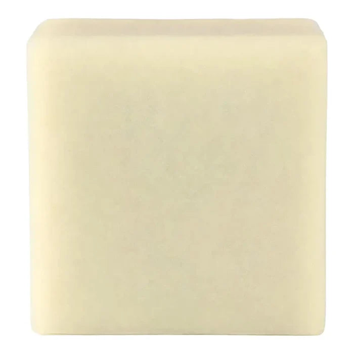 A square, pale cream-coloured solid soap bar shown against a plain white background.