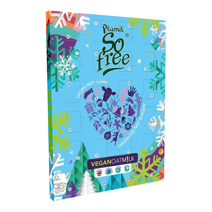 Vegan Oat Milk Advent Calendar, featuring a bright blue cover decorated with colorful winter-themed illustrations, snowflakes, pine trees, and a central heart graphic.