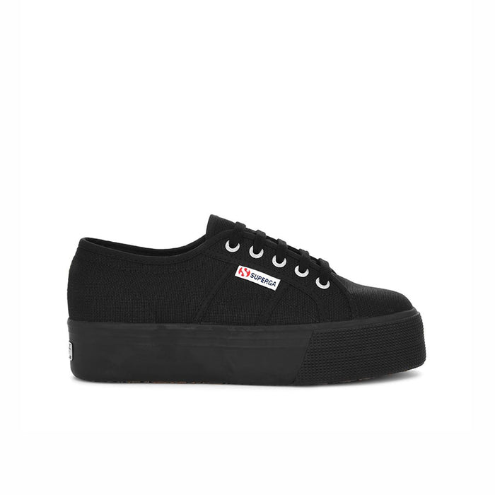 Black canvas low-top sneakers with lace-up front and rubber platform sole
