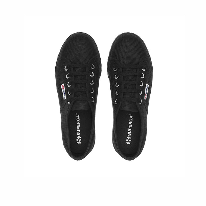 Black lace-up Superga sneakers, top view of two shoes with rubber platform sole