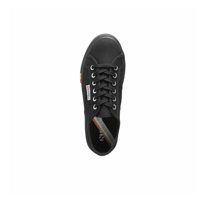 Black lace-up sneaker with textured upper, viewed from the side inside