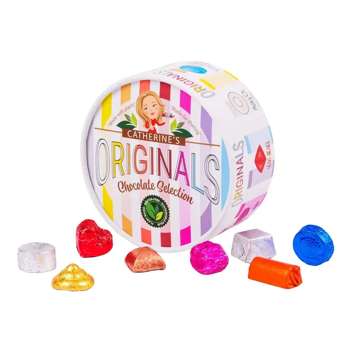 Catherine's Originals Chocolate Selection in a round white tin with colorful stripes and branding, with several assorted chocolates in foil wrappers placed in front on a white background.